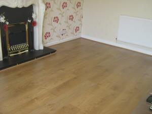 Laminate Flooring (2 of 2) - The finished laid floor with sound boarding underneath to reduce noise when walking on it