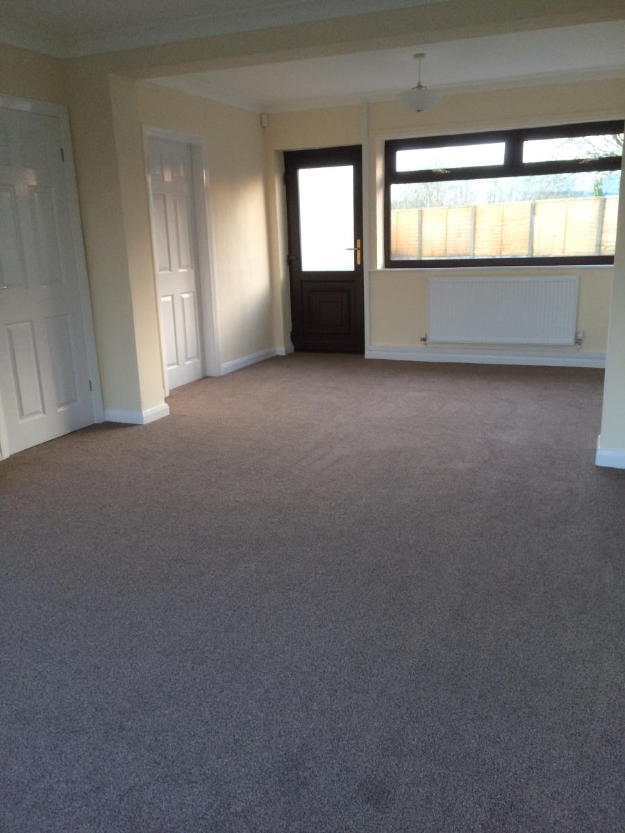 Photo - Large lounge and dining room carpet fitted to a home in Lostock Hall, Preston