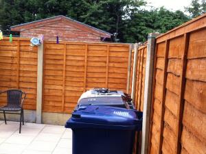 Replacement fence panels fitted in a Penwortham garden following storm damage Photo - Replacement fence panels fitted in a Penwortham garden following storm damage