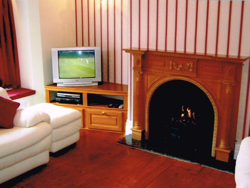 Wall-papering and polished flooring for a house with real coal fire in Chorley, near Preston Photo - Wall-papering and polished flooring for a house with real coal fire in Chorley, near Preston