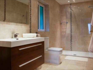 Luxurious fitted bathroom with walk-in shower installed as an en-suite to a hotel bedroom Photo - Luxurious fitted bathroom with walk-in shower installed as an en-suite to a hotel bedroom